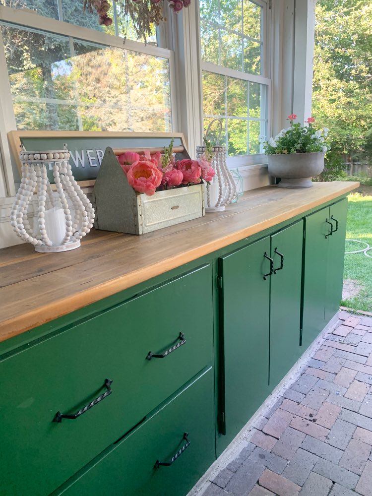 Back porch with green SW Courtyard cabinets